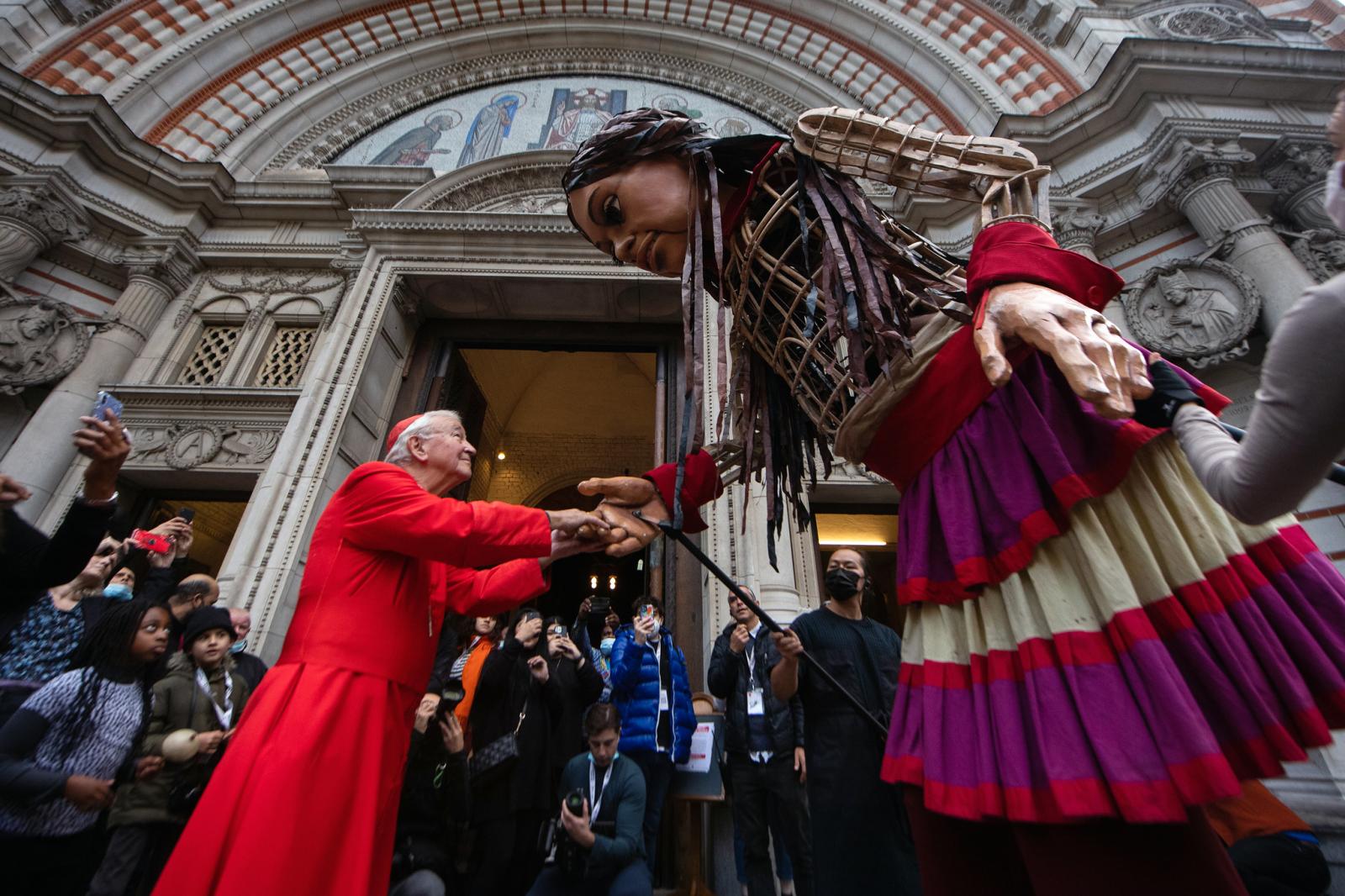 Little Amal is welcomed at Westminster Cathedral